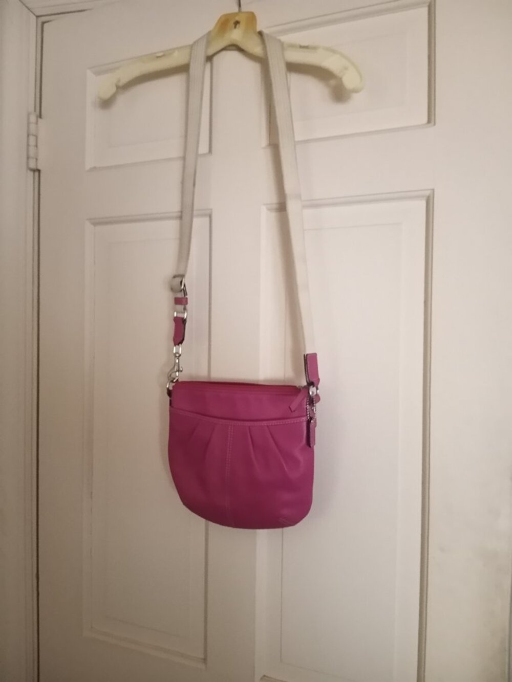 Coach Pink leather Crossbody bag, logo tag, adj cloth strap, deep bag
